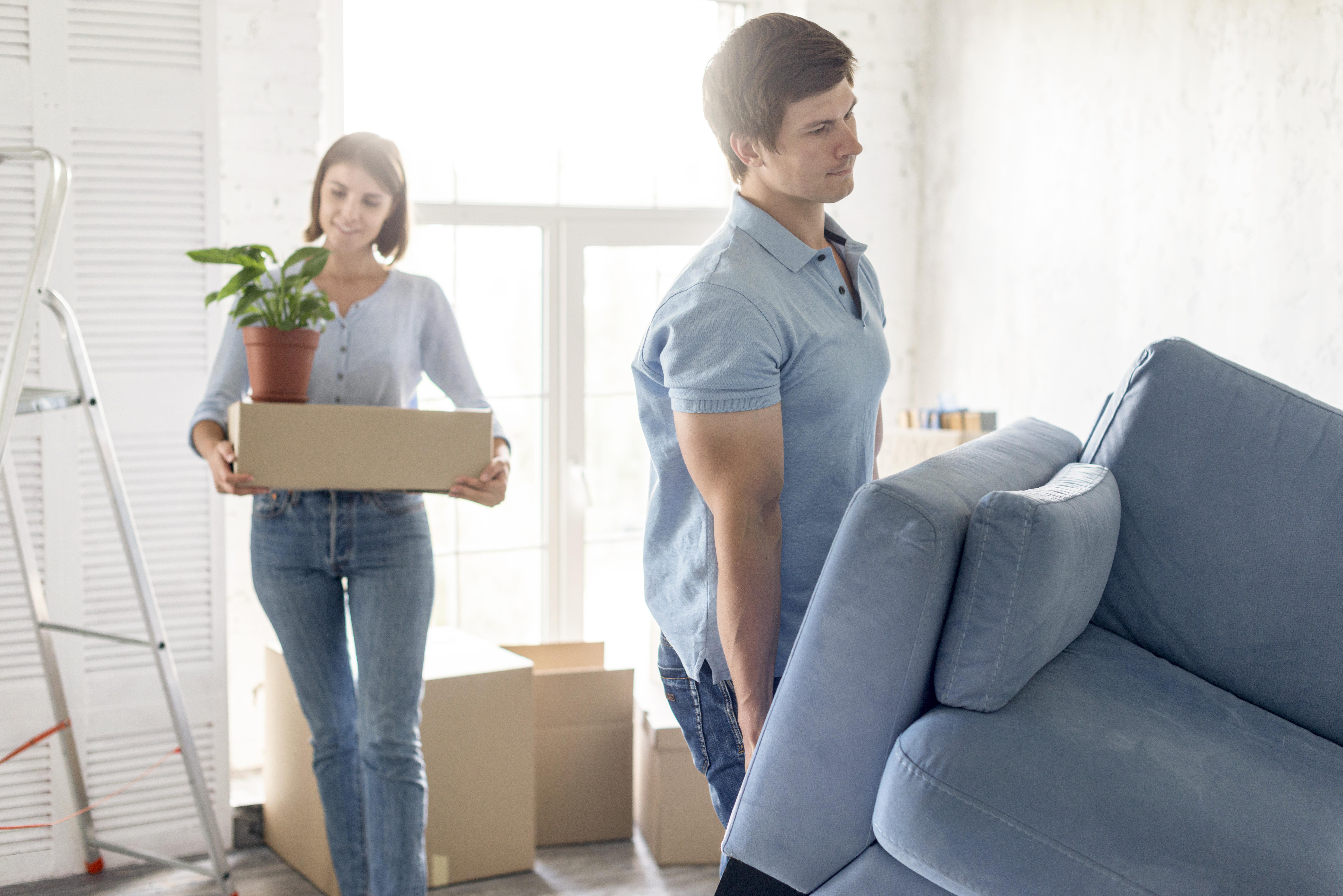 2 Happy people moving into their new home after using Pointo Removalists to compare Trusted Melbourne removalists