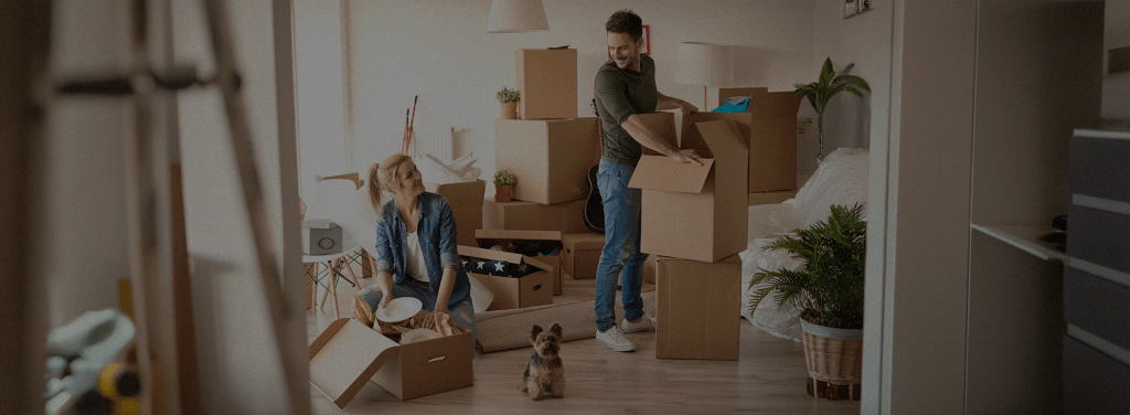 2 Happy People moving into their new home after using Pointo Removalists to compare trusted Melbourne removalists.