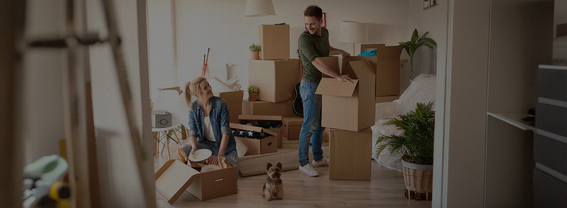 2 Happy People moving into their new home after using Pointo Removalists to compare trusted Melbourne removalists.